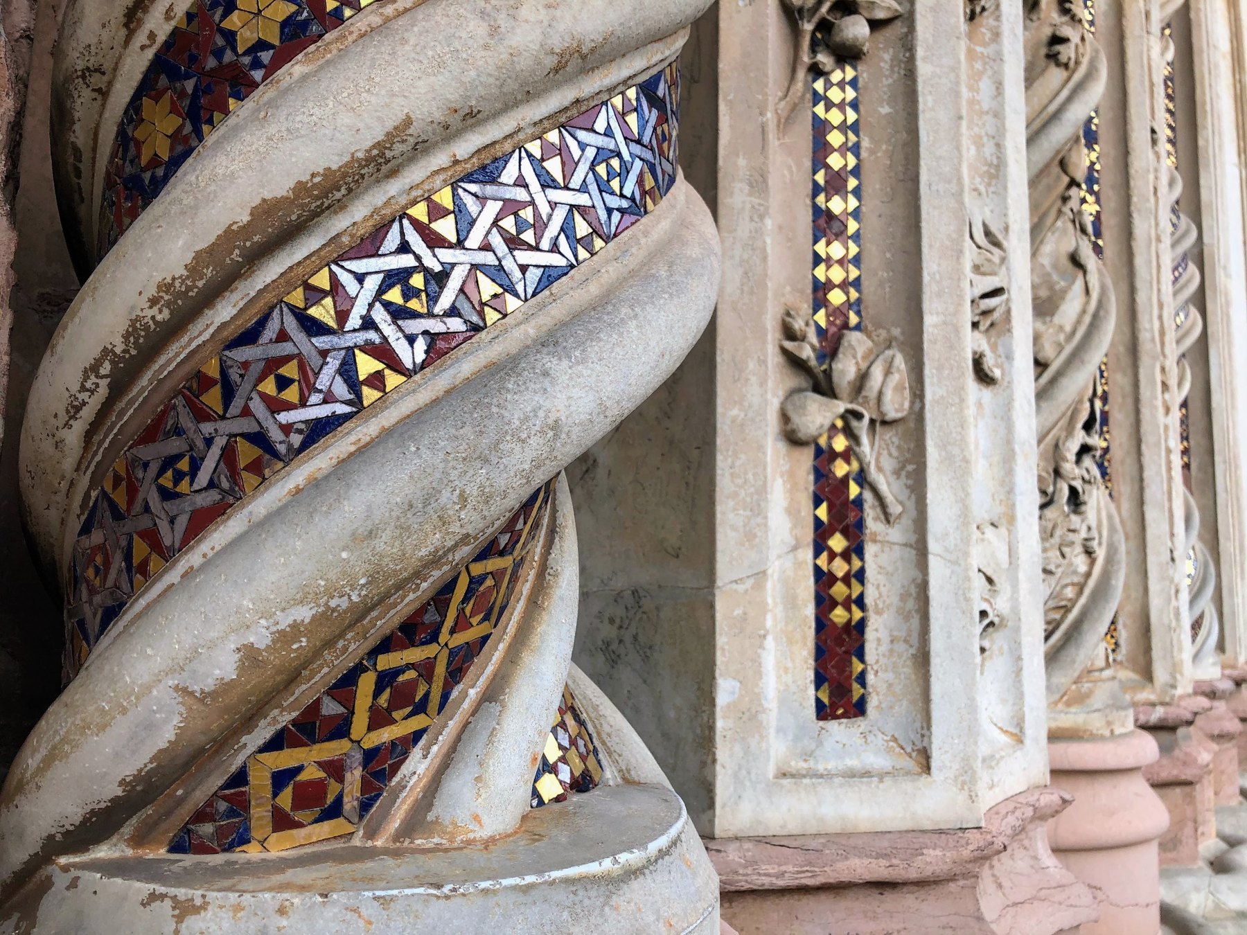 Close view of a colorful mosaic architectural column